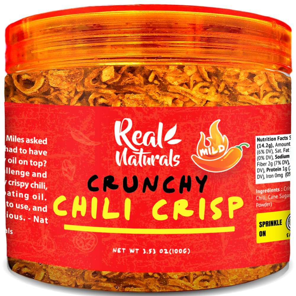 Real Naturals Chili Crisp jar close-up with crispy bits, perfect for ramen toppings.