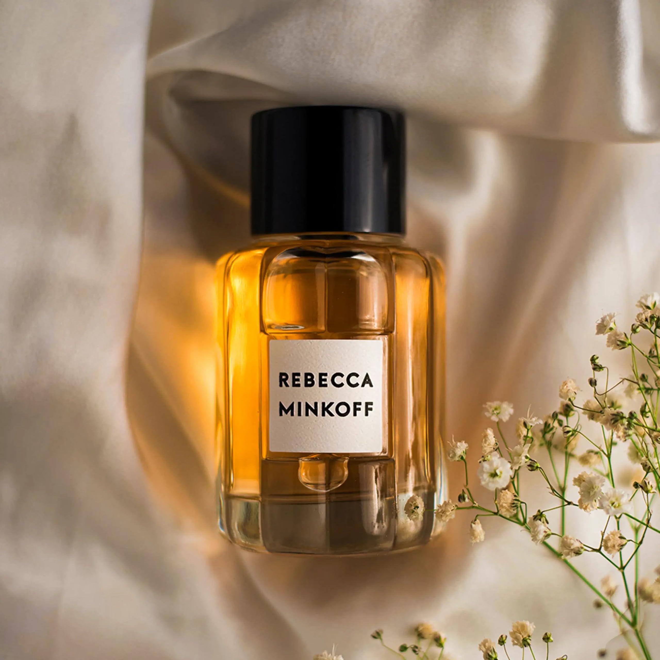 Rebecca Minkoff perfume bottle highlights tobacco warmth for evening depth