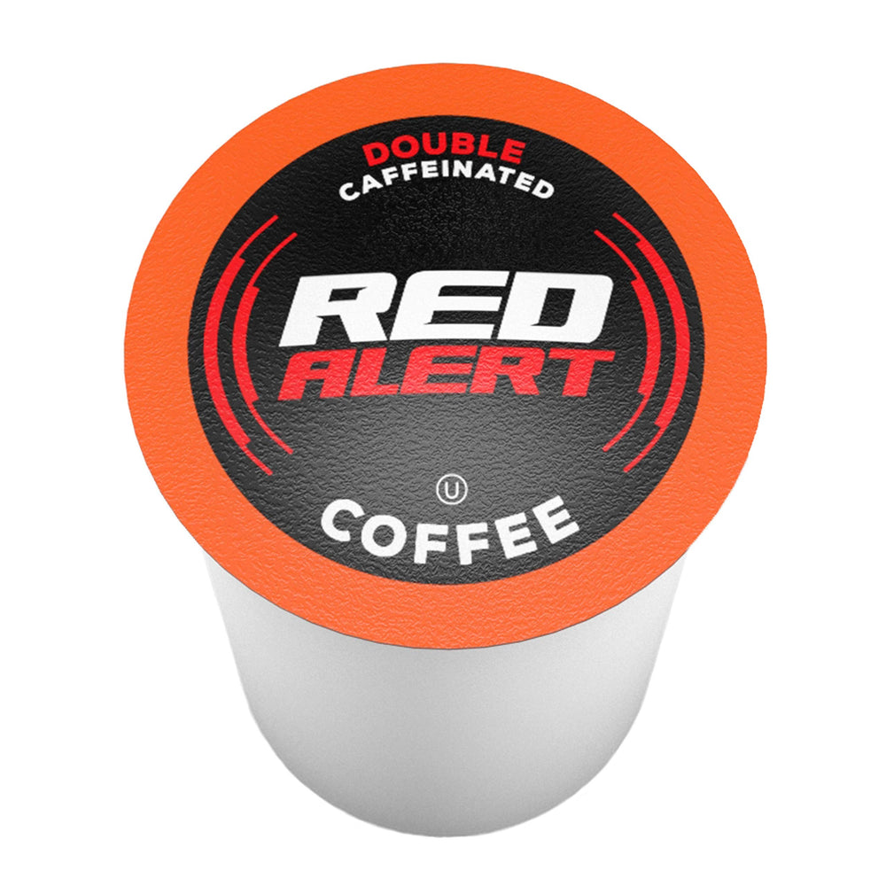 Red Alert pods beside a cup delivering a bold caffeine boost.