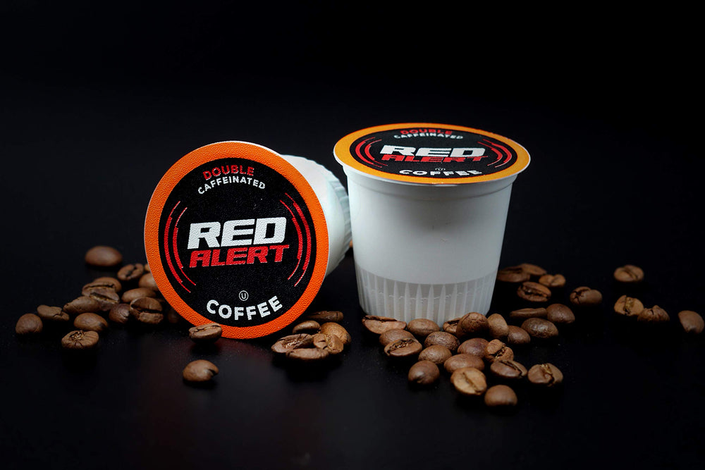 Red Alert recyclable pods symbolize eco-friendly choice.