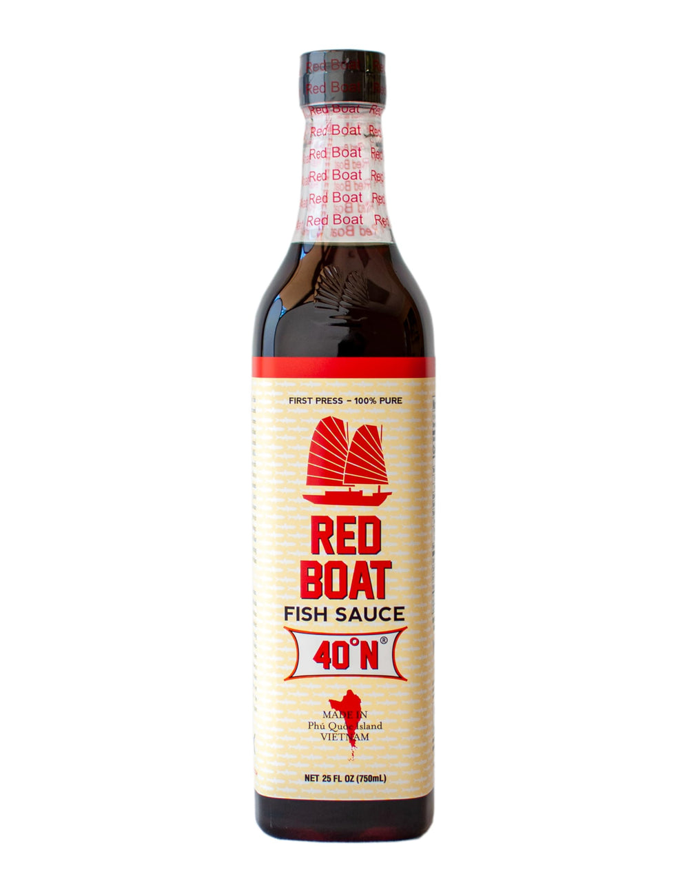 Red Boat fish sauce bottle front view, a versatile umami enhancer for dressings and marinades.