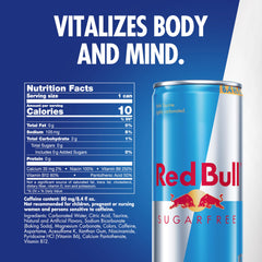 Red Bull Sugar Free can on desk with laptop for focused work.