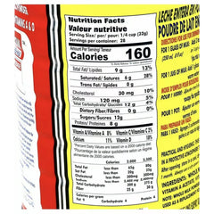 Nutrition panel on Red Cow milk powder tub highlighting calcium and protein