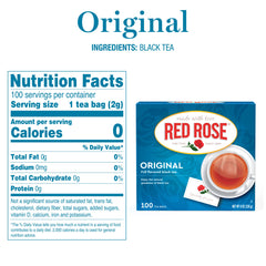 Red Rose Original tea bags steeping in mug for a rich, smooth cup.