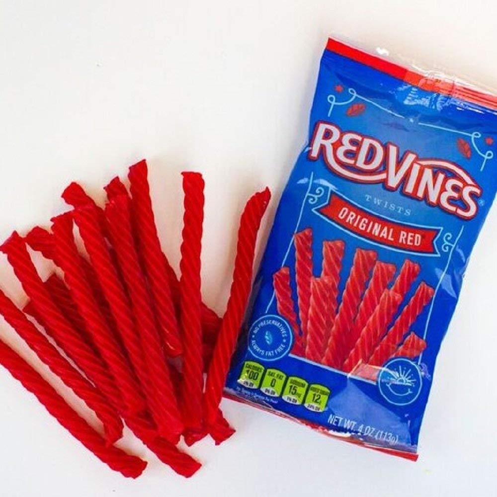 Office snack moment with Red Vines Original Red licorice twists 4-ounce bag.
