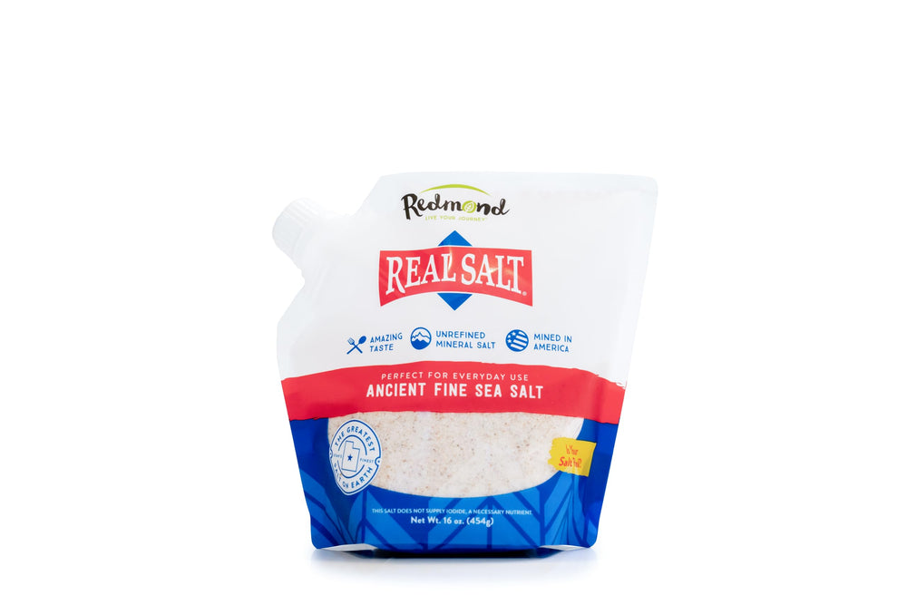 Redmond Real Salt ancient-sea-salt in a 16oz pouch enhances everyday cooking with natural sweetness.