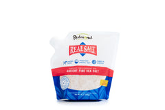Redmond Real Salt ancient-sea-salt in a 16oz pouch enhances everyday cooking with natural sweetness.