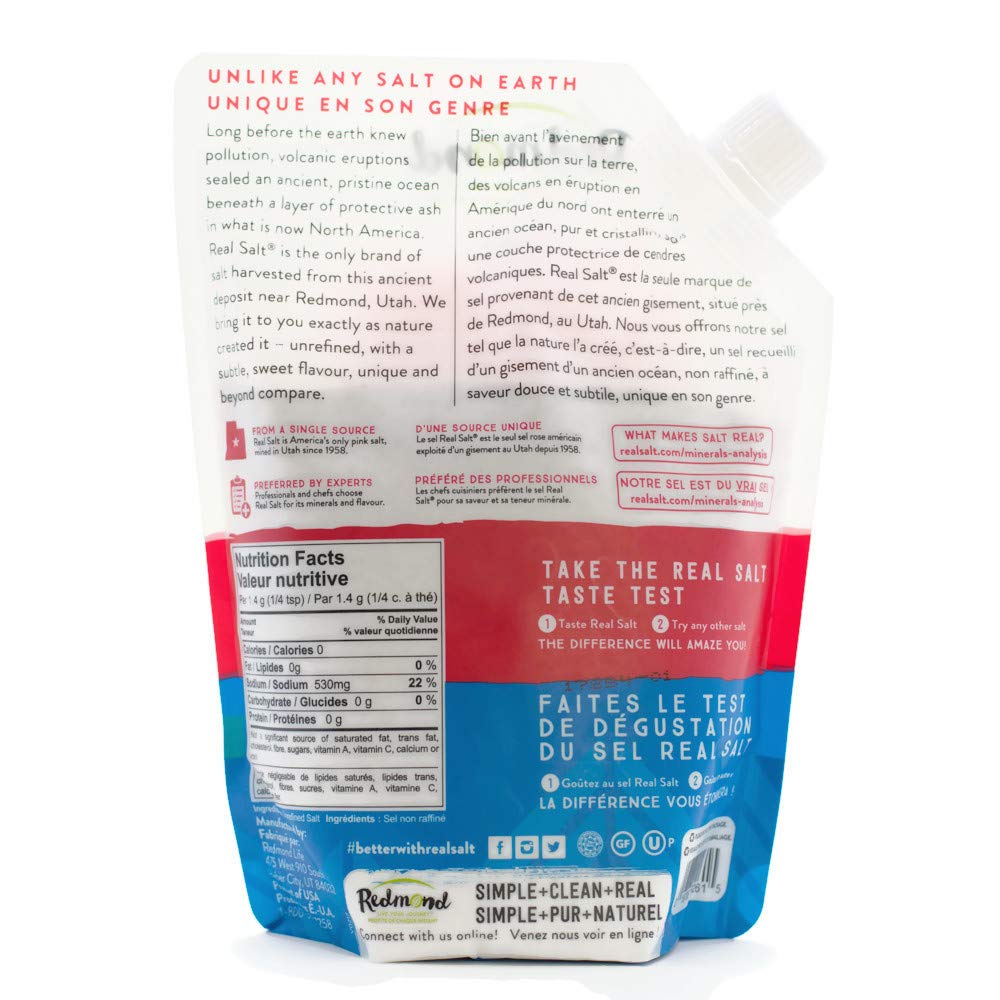 Redmond Real Salt crystals pouring from pouch into a spoon