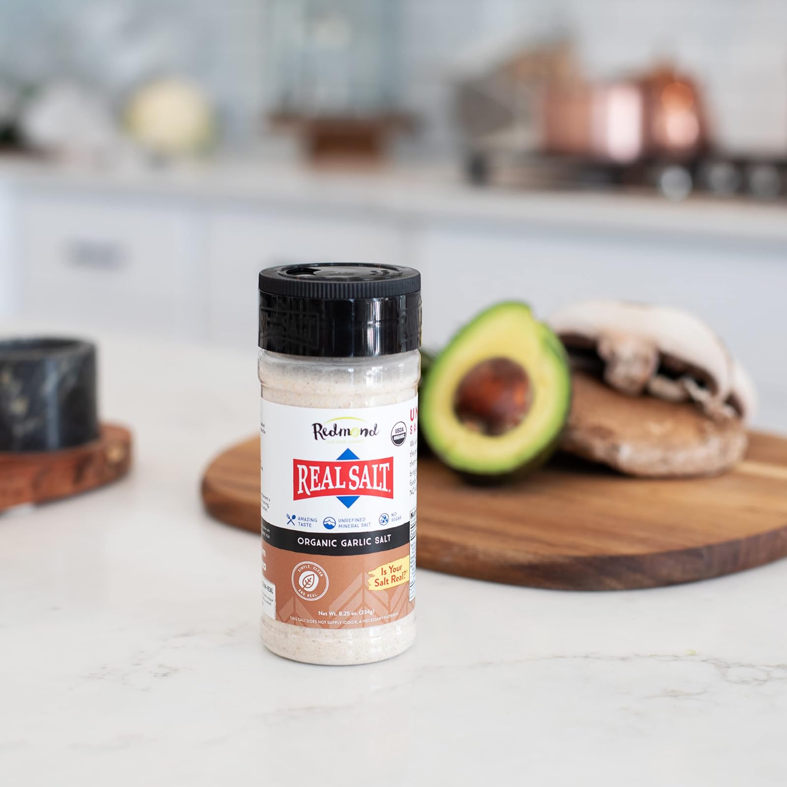 Redmond Real Salt Garlic Salt on grilled meat for savory flavor