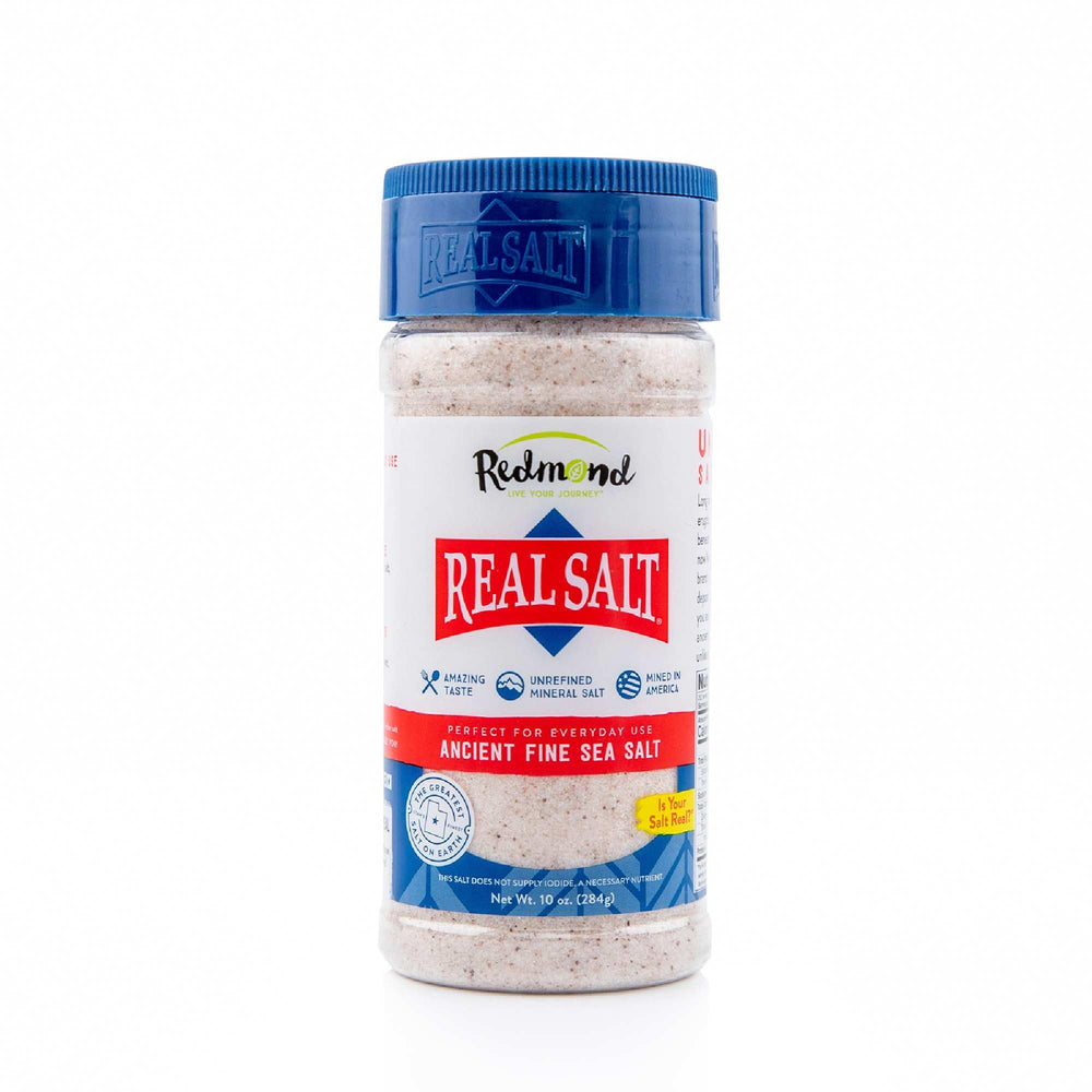 Redmond Real Sea Salt USA-mined packaging, trace minerals come from ancient seabed for natural flavor.