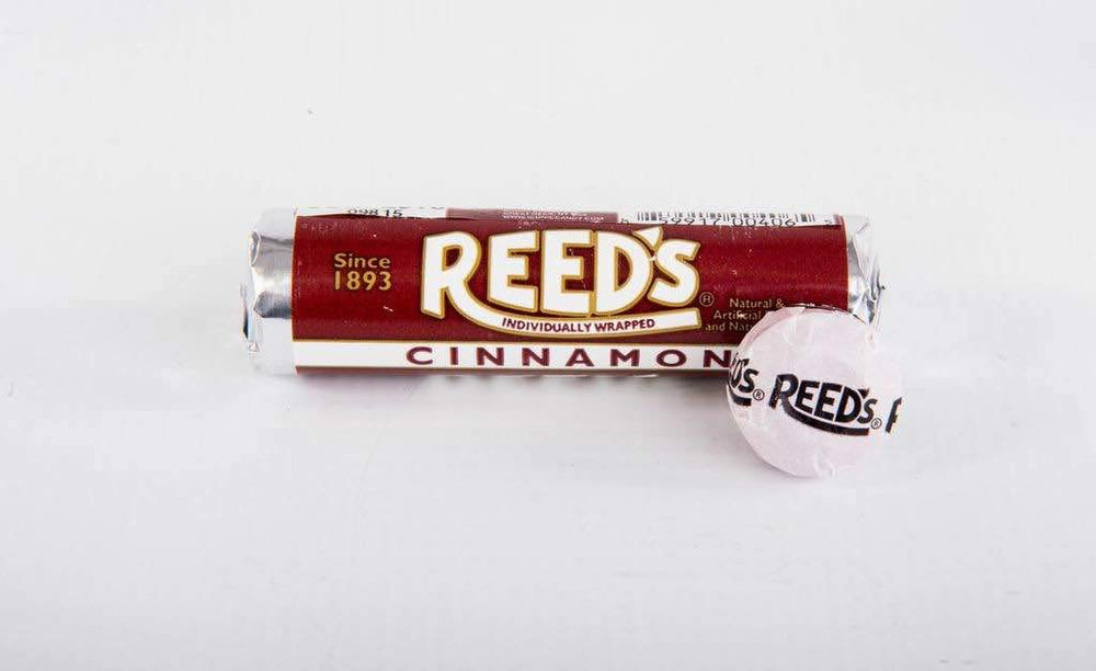 Close-up of Reed’s Cinnamon Candy Roll showing seven wrapped pieces.