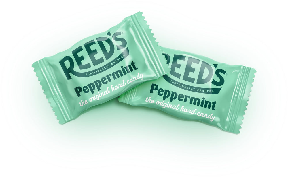 Reed's peppermint candy wraps closeup showing logoed wrappers and classic hard candy texture.