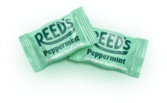 Reed's peppermint candy wraps closeup showing logoed wrappers and classic hard candy texture.