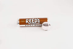 Close-up of Reed's logo on each wrapper highlighting tradition and quality.