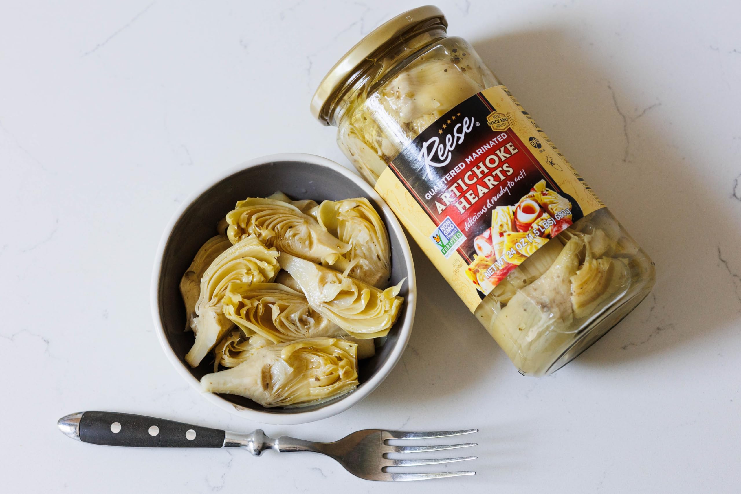 Reese artichoke pizza topping image, golden-browned and flavorful.