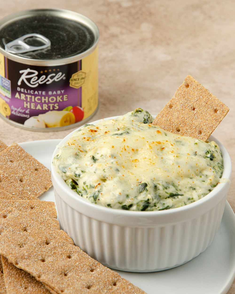 Reese artichoke hearts used in a creamy dip for sharing