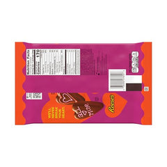 Close-up of Reese's heart-shaped peanut butter candies in silky milk chocolate.