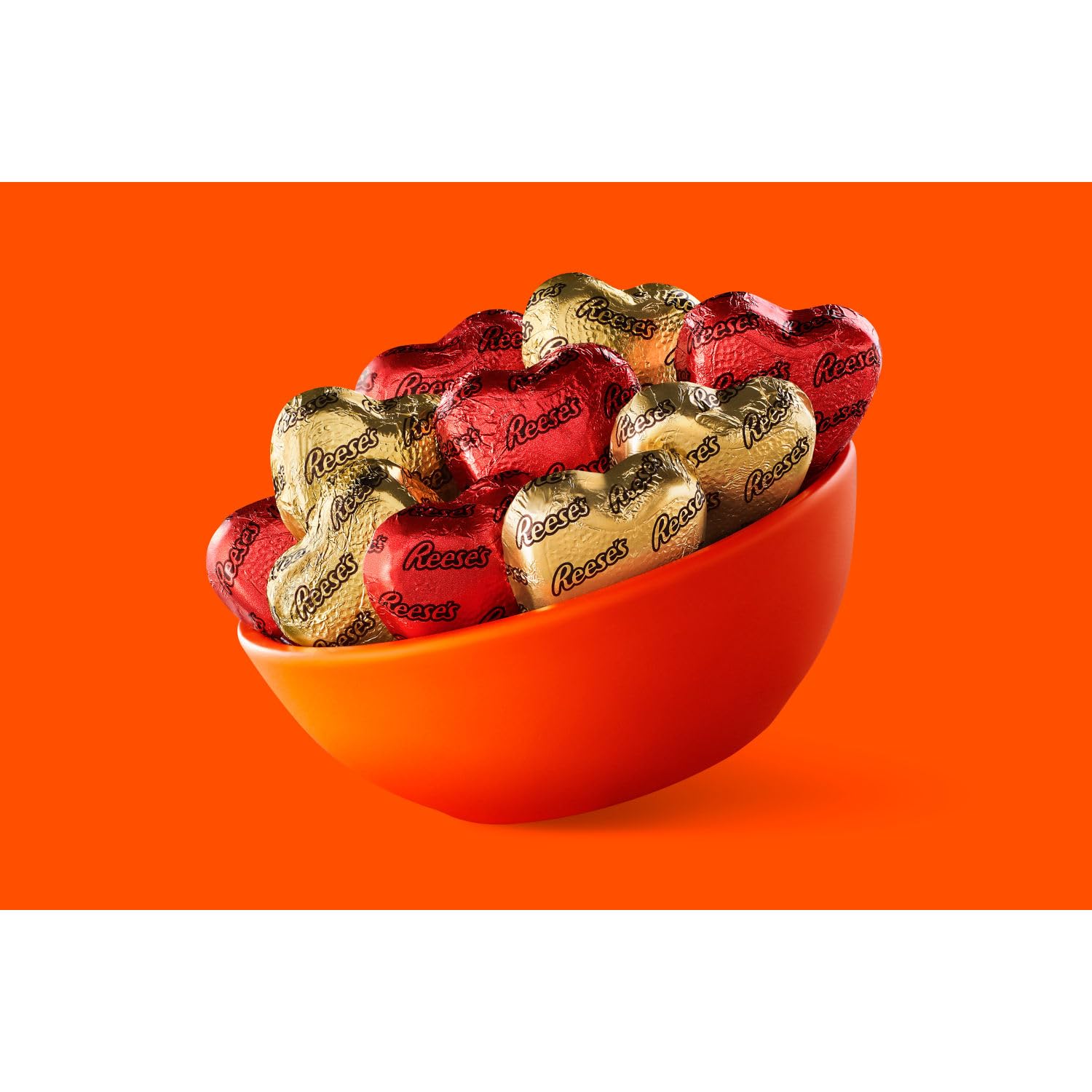 Reese's individually wrapped heart candies, kosher-certified treats for parties and celebrations.