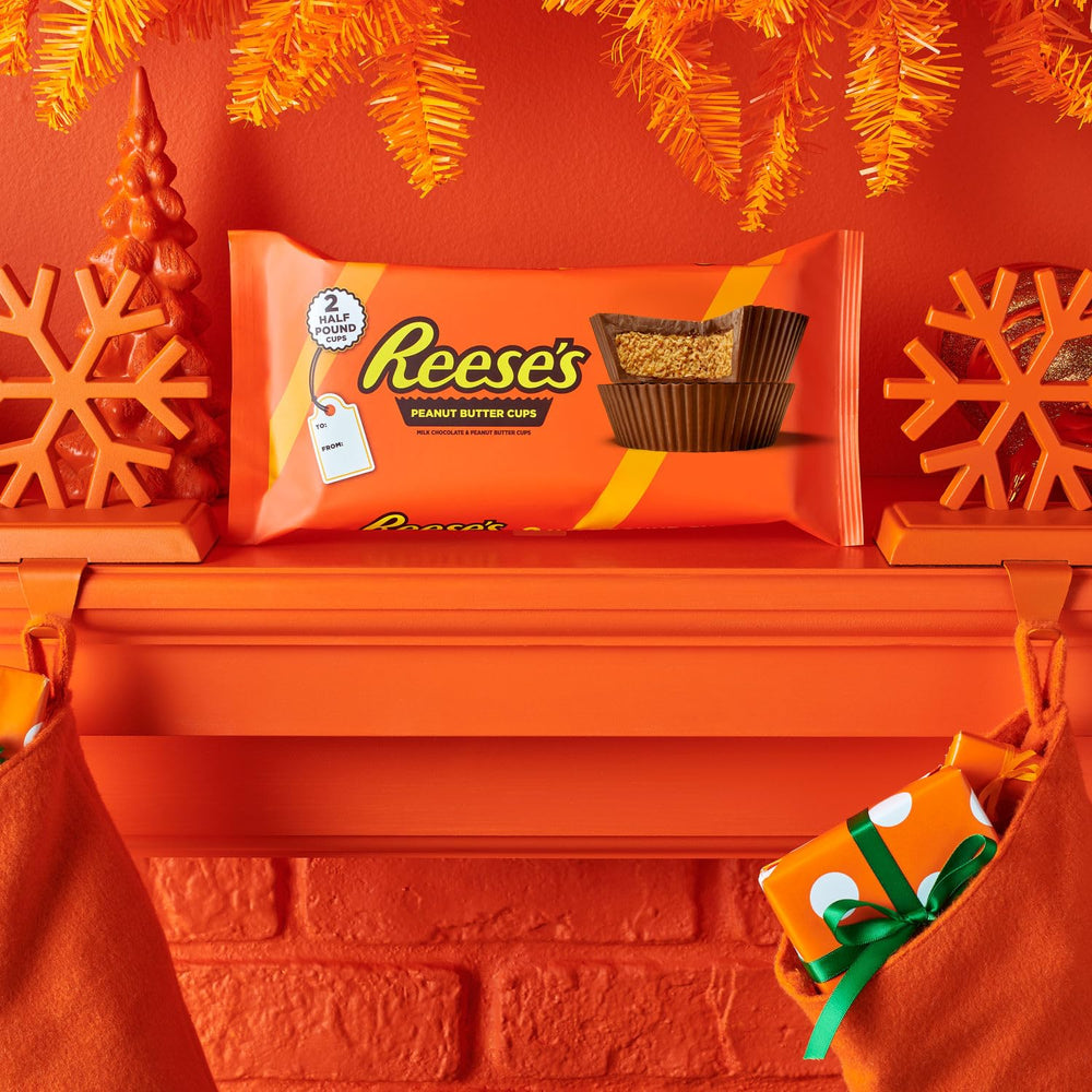 REESE'S Milk Chocolate Peanut Butter Cup Bar ingredients panel hints at simple indulgence.