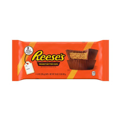 REESE'S Milk Chocolate Peanut Butter Cup Bar slab closeup highlights creamy peanut butter center.