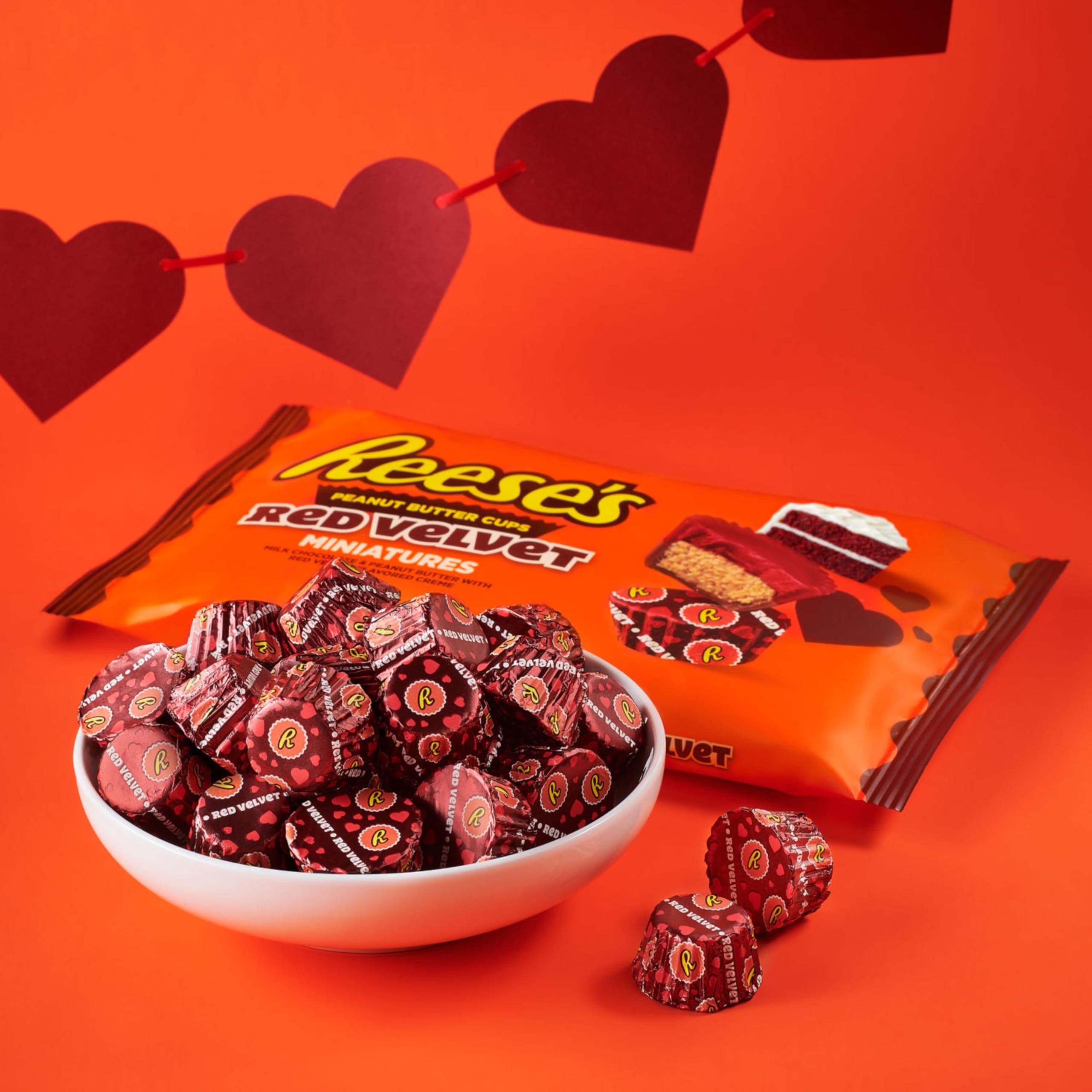 Baking with REESE'S red velvet cups to add festive flavor.