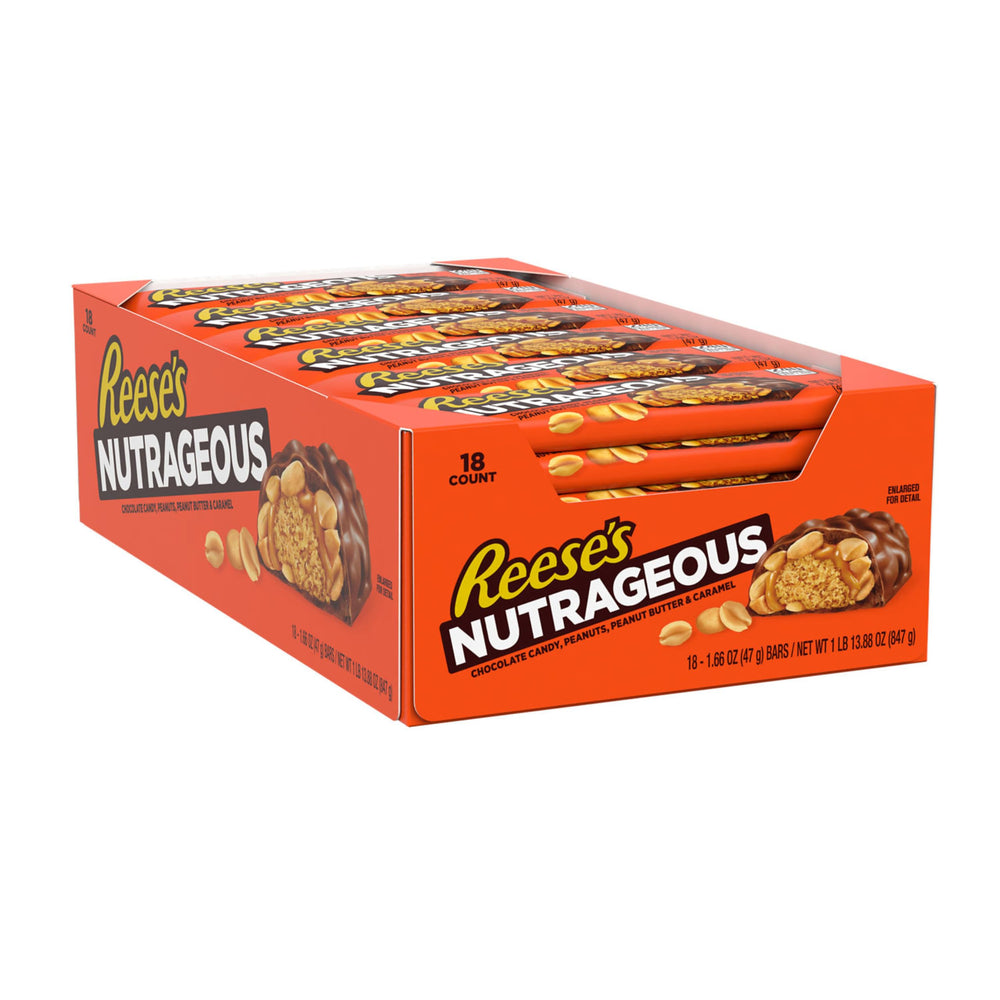 Closeup of a REESE'S NUTRAGEOUS bar showing chocolate, peanuts, and caramel