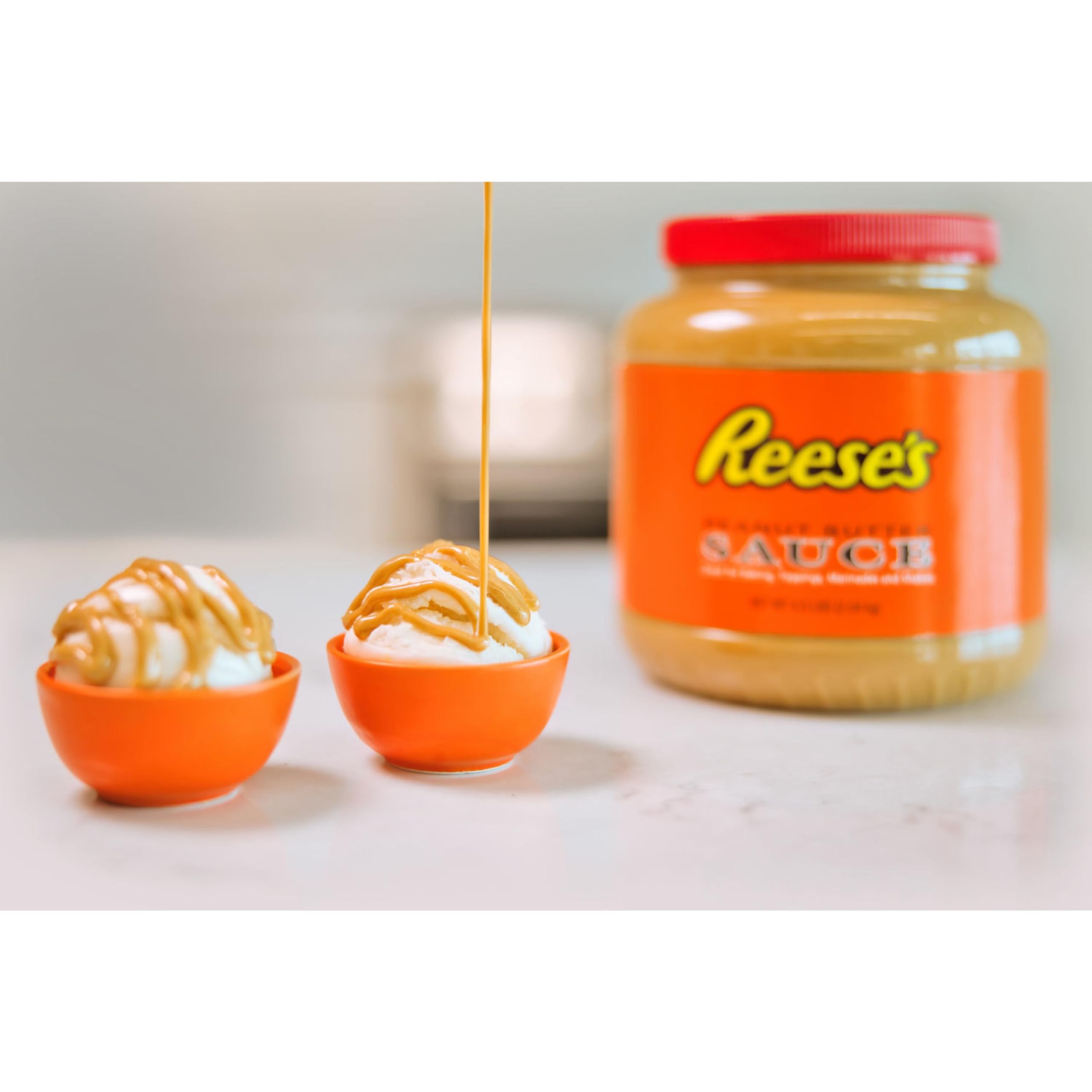 Reese's Peanut Butter Sauce bulk jar in pantry highlighting bulk value