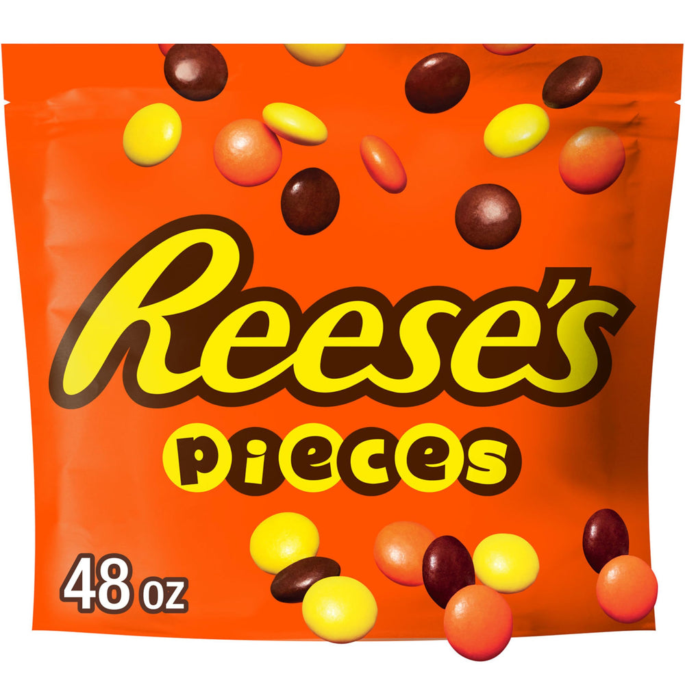 REESE'S PIECES bulk bag with peanut butter candy and crunchy shells for snacking.