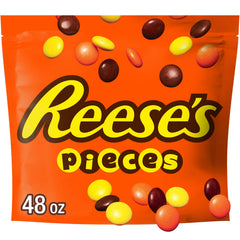 REESE'S PIECES bulk bag with peanut butter candy and crunchy shells for snacking.