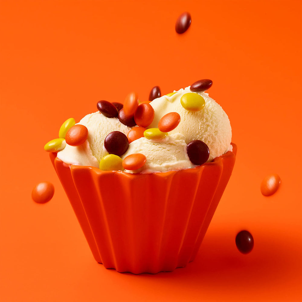 Reese's Pieces dessert-table display showcasing candy bowl fillers