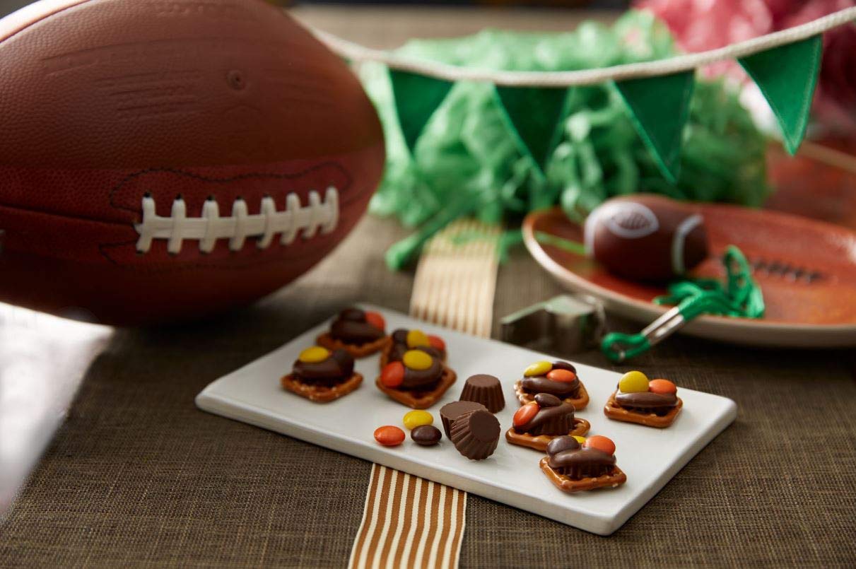 REESE PIECES in a lunchbox, kid-friendly treat for midday energy.