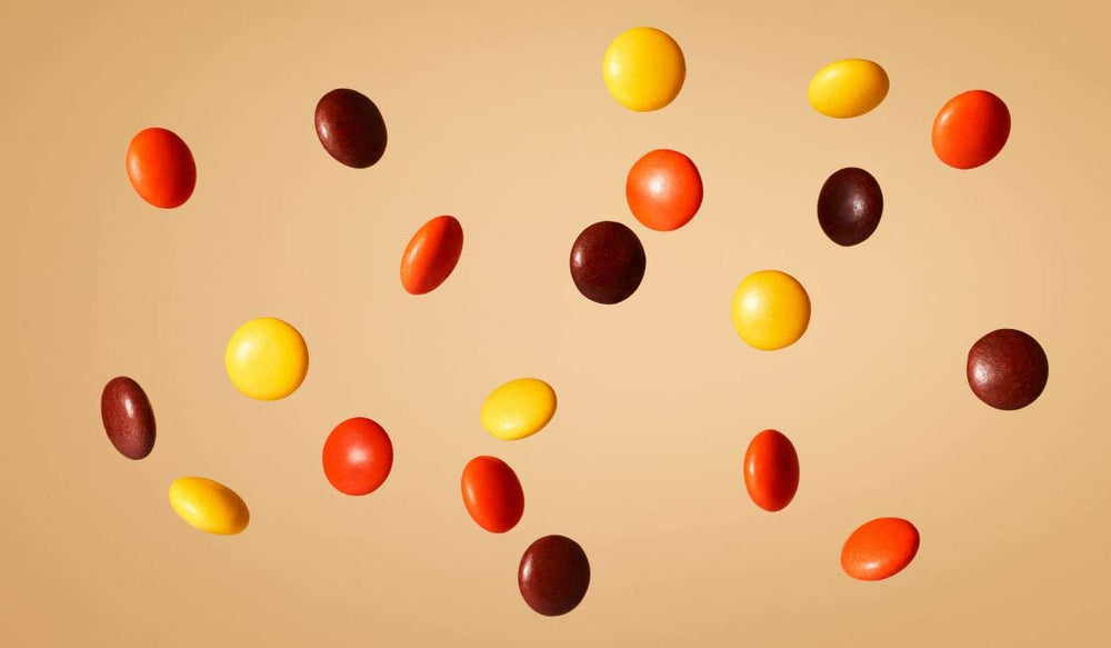 REESE PIECES in a party bowl display, great for gatherings.