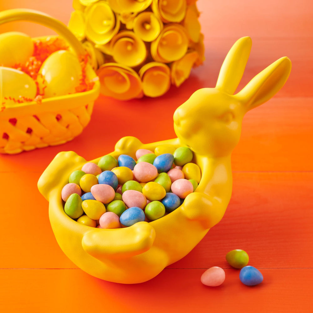 Colorful pastel shells on Reese's Pieces eggs that brighten spring snacking.