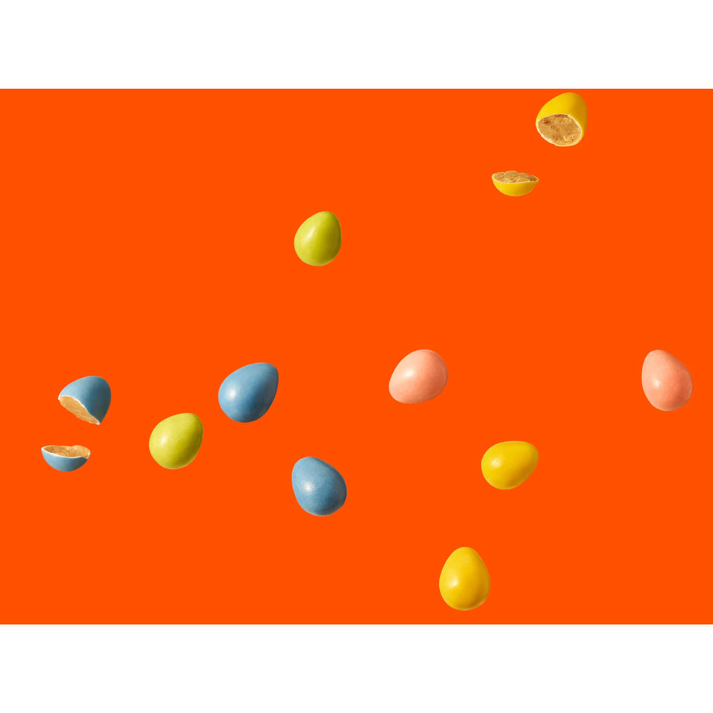 Kids enjoying Reese's Pieces Peanut Butter Eggs as a quick snack.