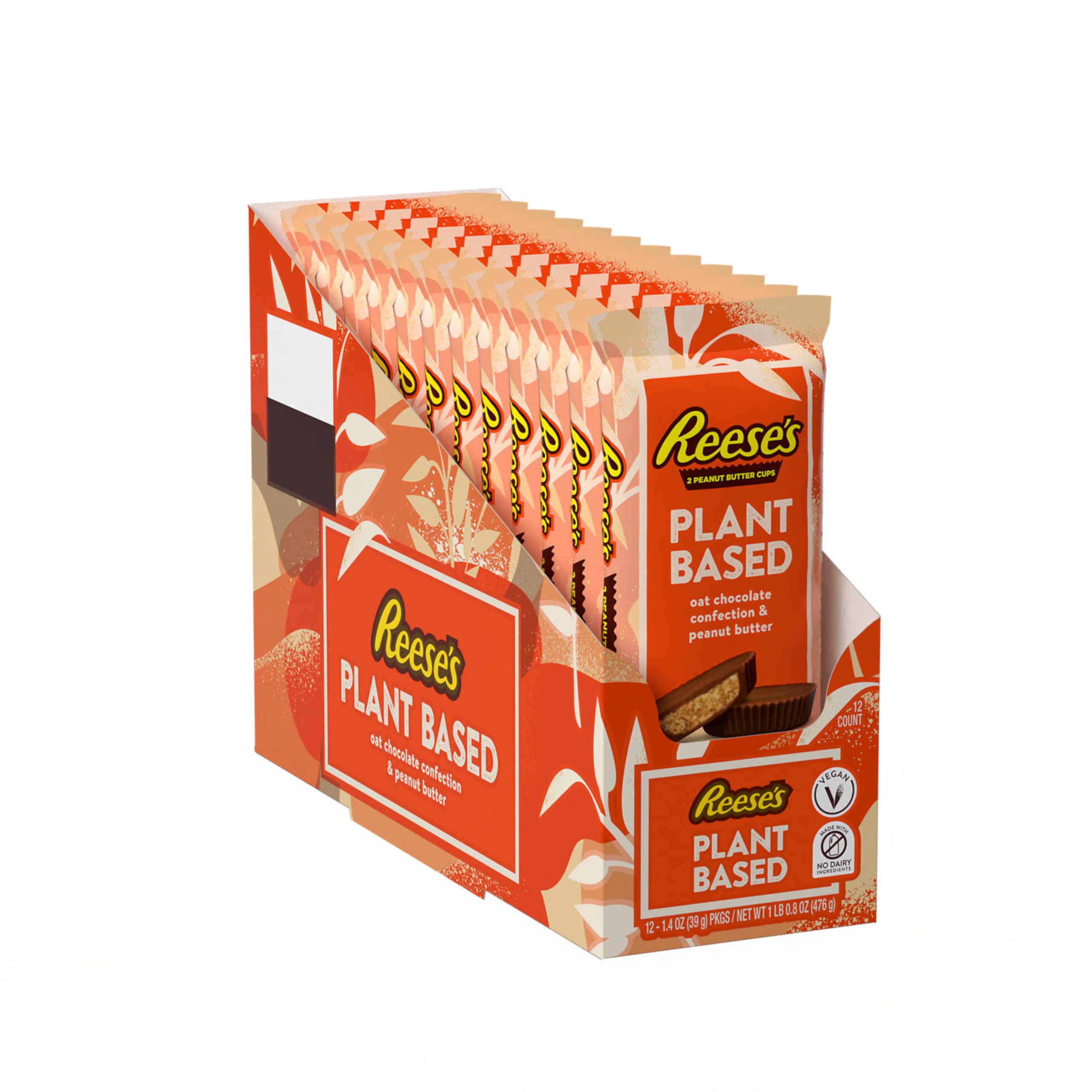 Bite shot of REESE'S Plant Based Oat Cups shows creamy peanut butter center.
