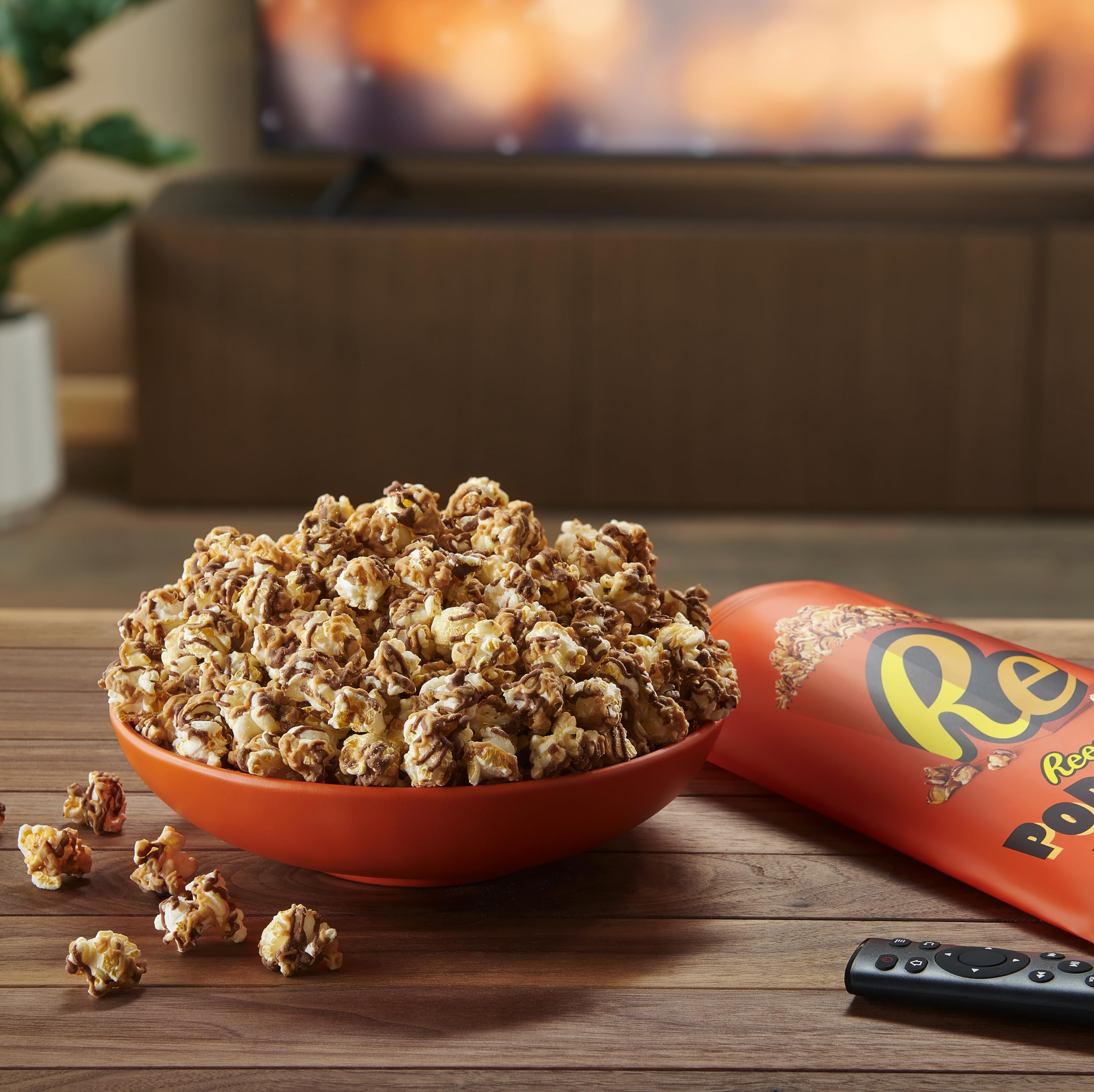 Desk-friendly Reese's Popcorn snack, perfect for travel and trips