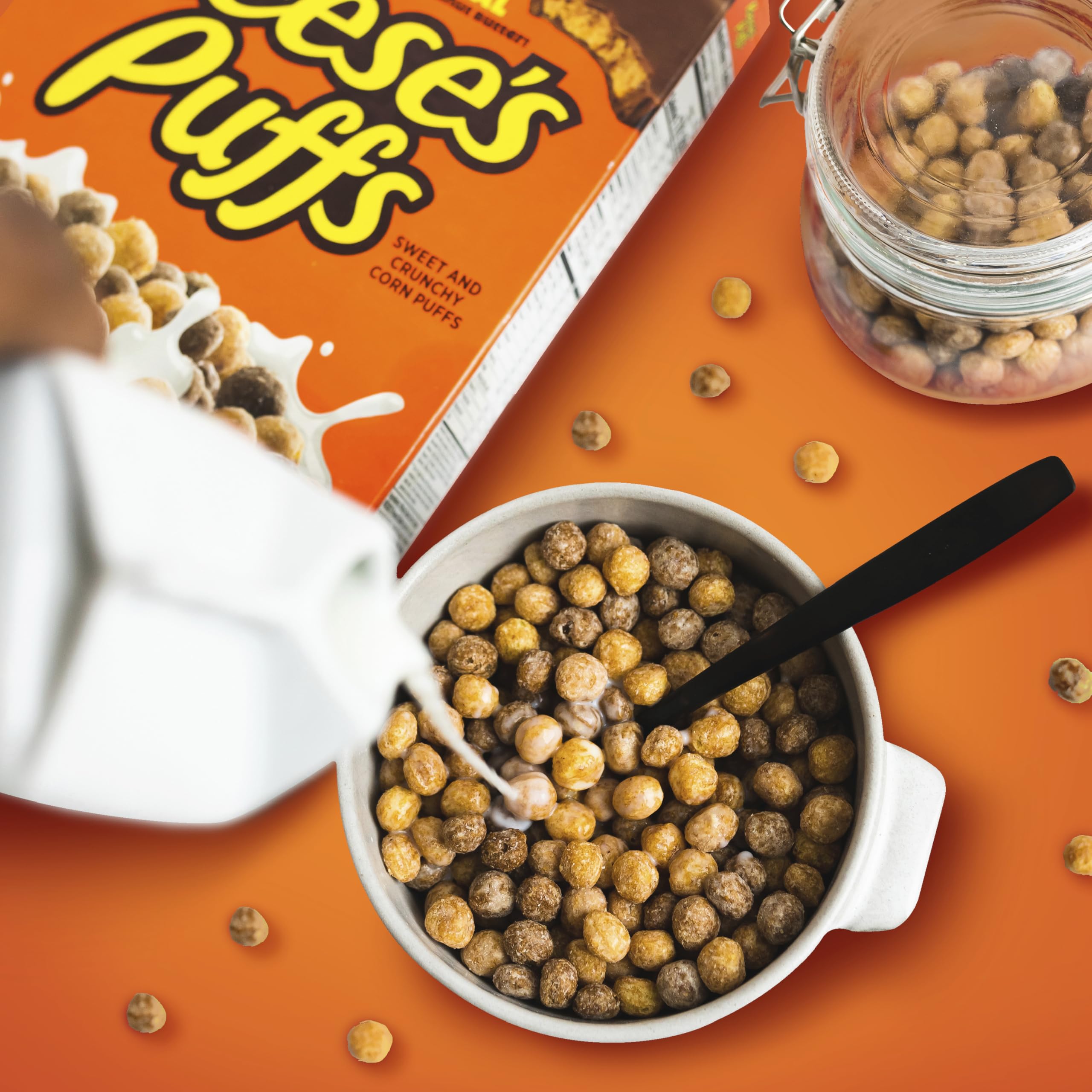 Reese's Puffs sprinkled on ice cream for a sundae bar