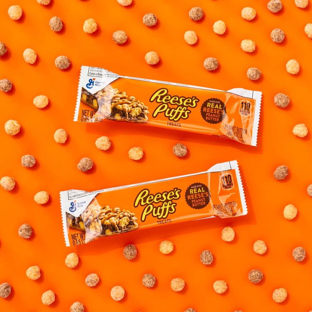 REESE'S Puffs Treat Bars cereal pieces close-up highlighting texture.