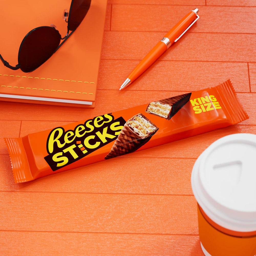 Concession stand setup featuring REESE'S STICKS in bulk packaging