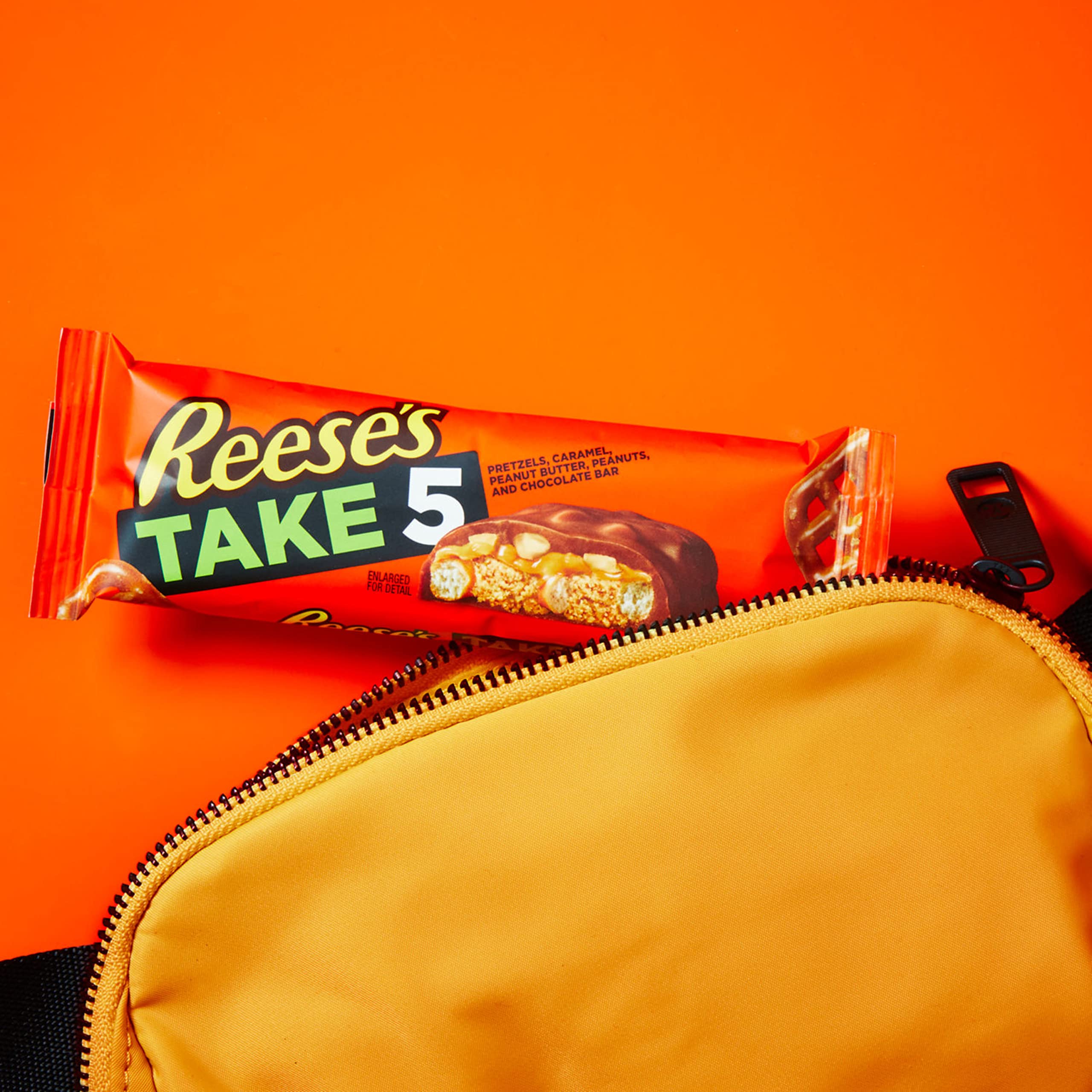 REESE'S TAKE 5 chocolate-coating close-up, melts smoothly for a treat.