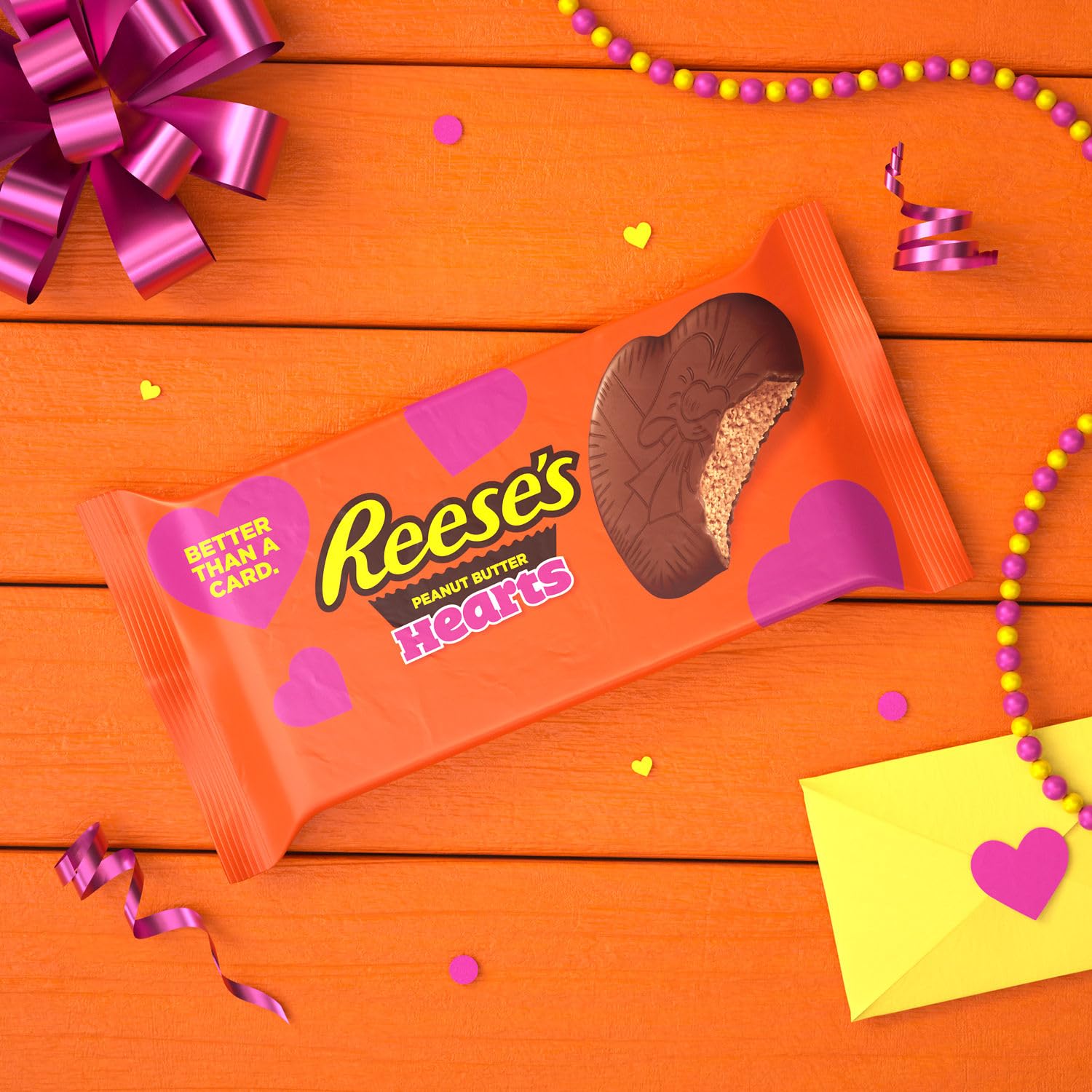 Unwrapped REESE'S milk chocolate hearts ready for gifting