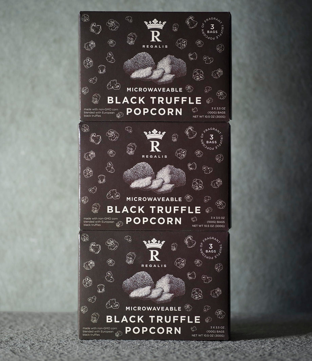Regalis brand logo on pack reinforces premium popcorn experience