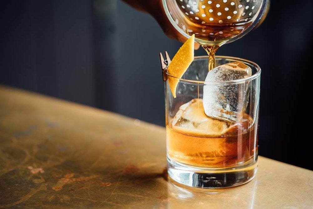 Regan's Orange Bitters No. 6 bottle side view, ideal for crafting complex Old Fashioned flavor