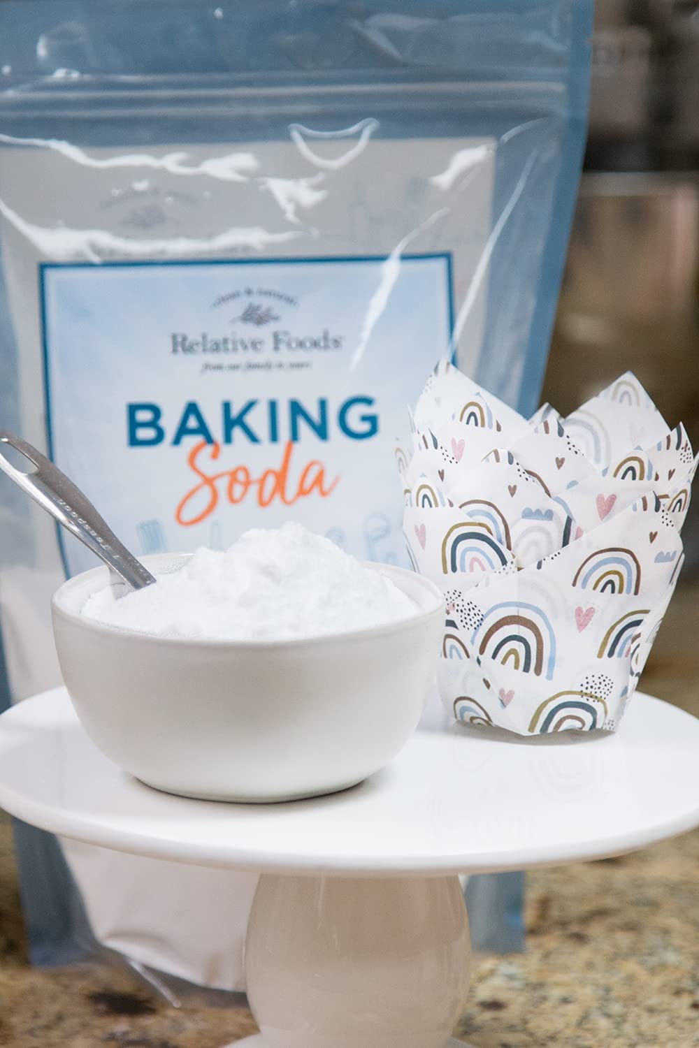 Relative Foods Baking Soda bulk container on pantry shelf, all-purpose cleaner.