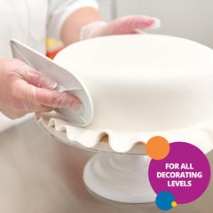 Renshaw white fondant coverage on cake for a sleek, even finish.