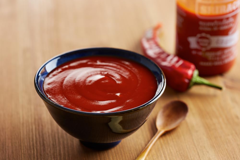 Rex Sriracha-marination-bottle for flavorful, grilled proteins
