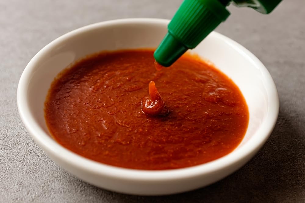 Rex Sriracha-pizza-bite glaze enhances pizza night flavor
