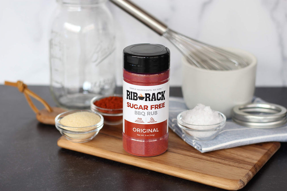 Rib Rack Original Sugar Free BBQ Rub graces grilled meats with balanced, savory flavor.