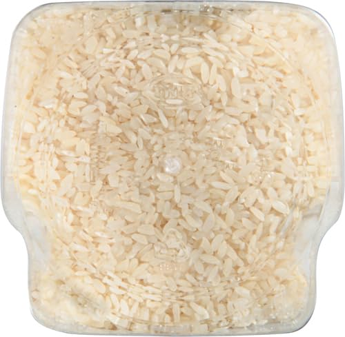 Steam rising from RiceSelect short-grain rice in a pot