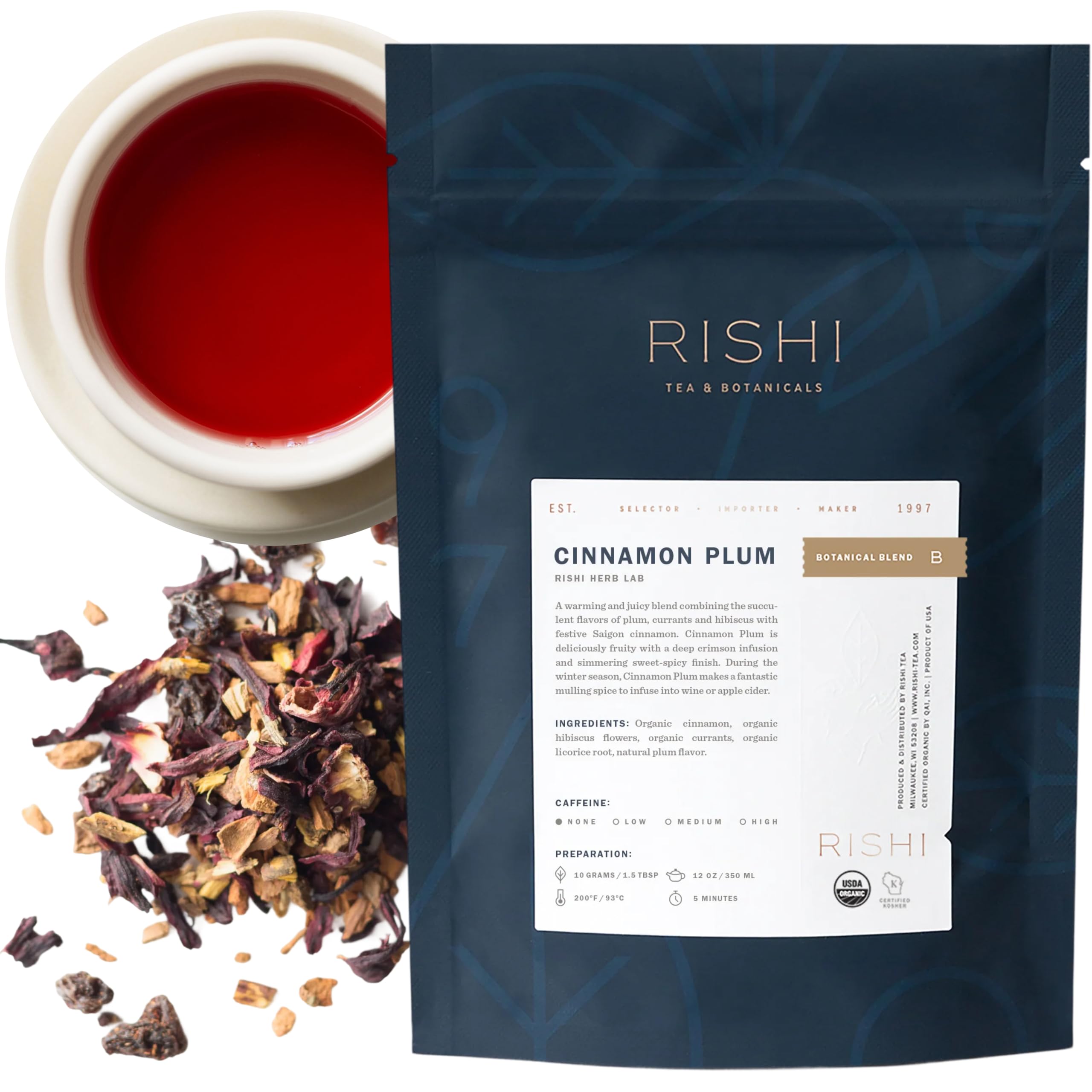 Rishi Cinnamon Plum herbal tea leaves steeping for a cozy afternoon.